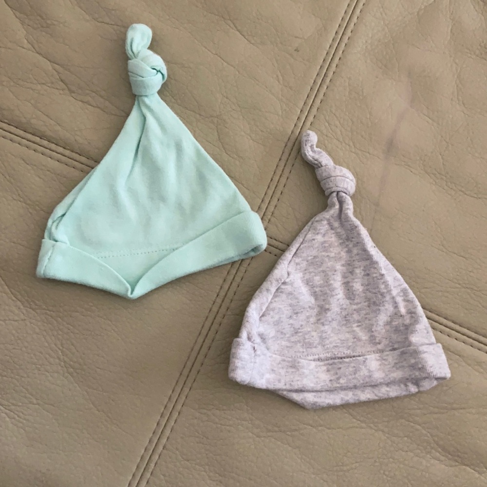 Two newborn hats.